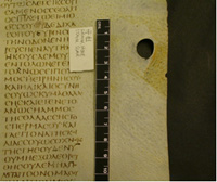 Maker’s hole (scraped) in BL f.61r